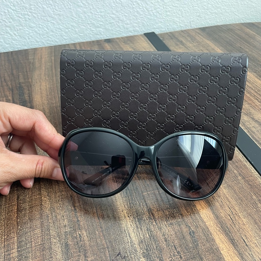 GUCCI Sunglasses. Never worn. Comes with case.